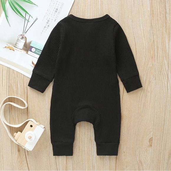 Baby Romper in Black with Henley Button Detail - Picture 2 of 5